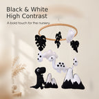Black and white dinosaur nursery mobile with felt shapes