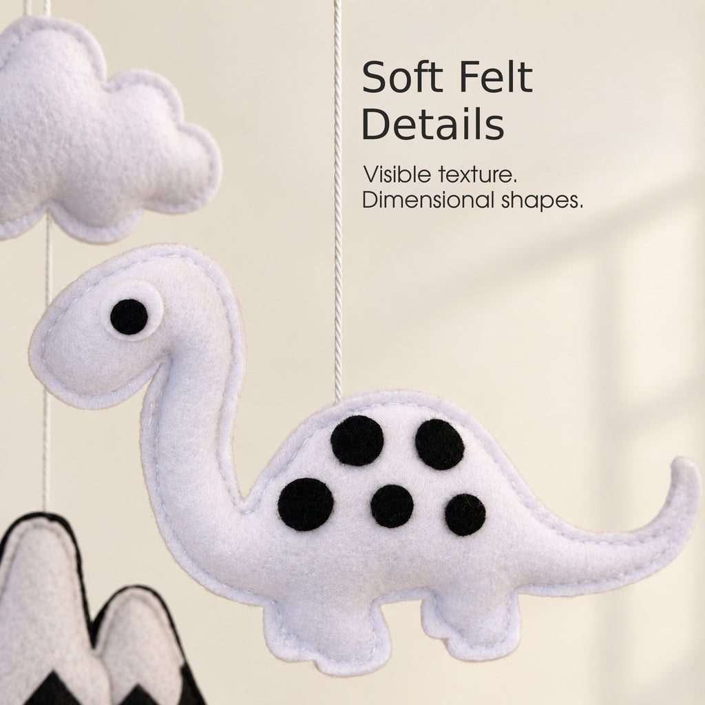 Close-up of felt dinosaur details on VLOKUP baby mobile